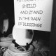 Post it that reads, "Put down your shield and stand in the rain of blessings."